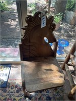 Carved pine chair with horse motif