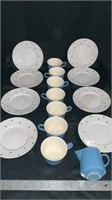 Polka dot small plates, coffee cups, creamer,