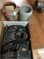 Baby shoes , vase and mug