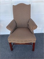Small scale, upholstered wing chair,