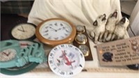 Wall clocks ,barometer and figurine