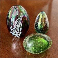 Three Glass Egg Shaped Paperweights