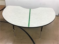Kidney table approximately 68" wide with