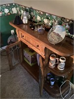 Glassware in cabinet behind bar and bar area
