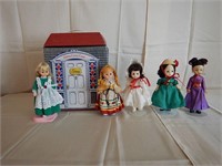 Three Vogue and two Ideal dolls with carry case: