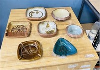 7 pottery ashtrays - signed