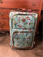 Marked Gloria Vanderbilt suitcase