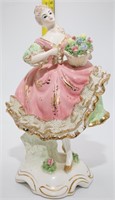 Antique Porcelain Woman with Flowers