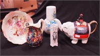 Five pieces of decorated china: boy on elephant,