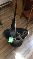 Ash bucket with shovels and antique roller skates
