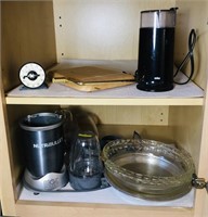 NutriBullet blender, Braun coffee grinder, glass
