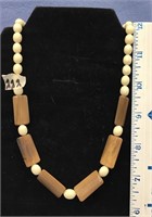 Approx. 18" ivory bead necklace, with rectangle ch
