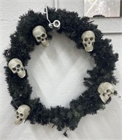 (W) Decorative Skull Wreath With Purple Lights.