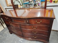 Mahogany double dresser with mirror by Dixie.