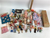 A variety of plastic dolls in many different