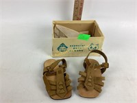 Leather size 2 1/2 baby sandals by nine company.