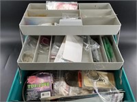 Tackle box full of misc. fishing supplies and hali