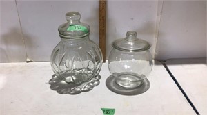 2 glass canisters.