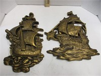 Pair of plaster ship wall hangings
