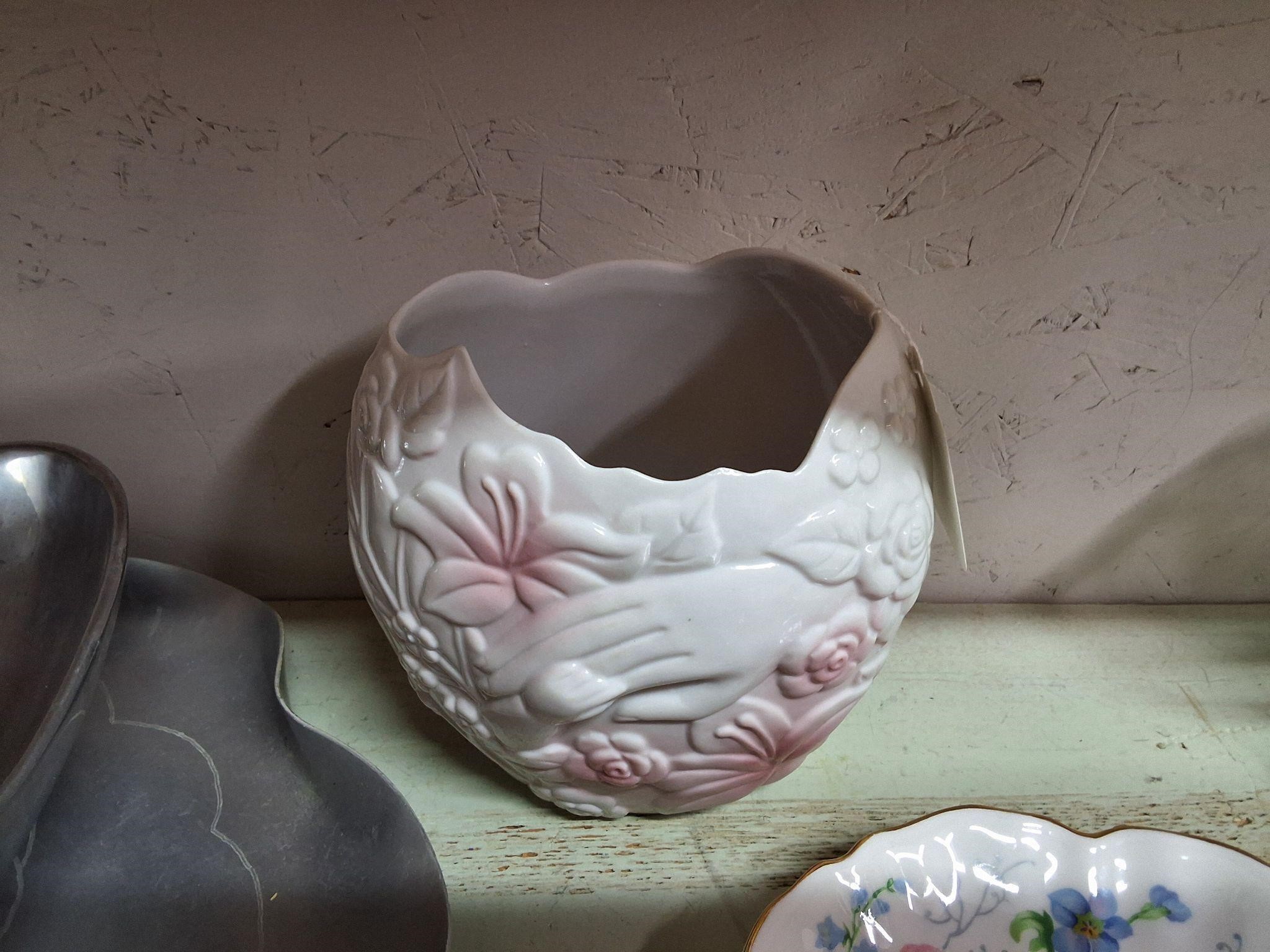Porcelain vase Mothers and babies hands