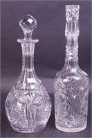 Two non-matching glass decanters, one 12"