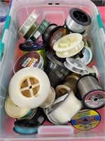 BOX OF FULL AND PARTIAL ASSORTED FISHING LINE