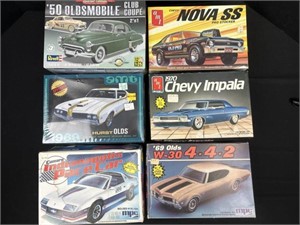 6 plastic models two in cellophane models are