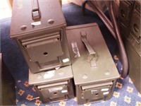 Three larger empty military ammo cans