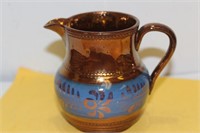 A Lusterware Ceramic Creamer