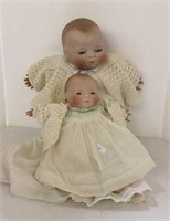 Vintage children’s dolls with porcelain faces