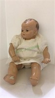 Antique child’s doll in clothing - does have