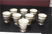 A Set of 8 Dermitasse Cup With Sterling Holder
