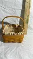Small longaberger basket with handle and floral