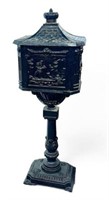 Painted Cast Iron Mailbox Stand w/ Relief Images.