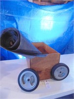 wooden box, wheels, landscape fabric