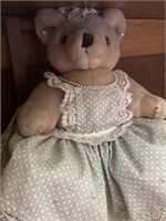 Teddy bear on wooden chair