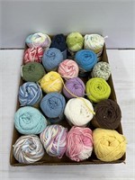 Colorful smaller spools of yarn