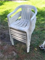 6 white plastic molded patio chairs