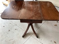 Antique drop leaf table with claw feet