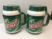 2 new old stock Mountain Dew Whirley jugs