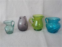 4- hand blown colored creamers each x 4
