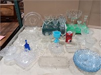 Glassware. Cake plates 12. Candle stick holders.
