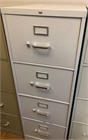 Four drawer HON cream metal filing cabinet