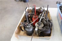 Flat of various oil cans
