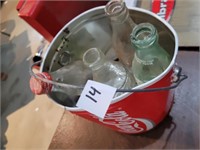 coca cola pail , 4 bottles