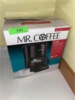 MR. COFFEE COFFEE MAKER- TURNS ON