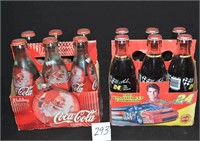 2 cases of full Coca-Colas 1 case is Jeff Gordon