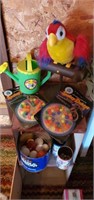 Battery operated parrot, toys, balls, marbles