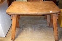 (2) Wooden sawhorses w/ a laminated tabletop (not