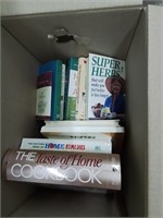 Box with a cook book in many self-help books